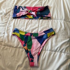 Two pice high waisted, bandeau swimsuit. Size medium. Multicolored. NEW.